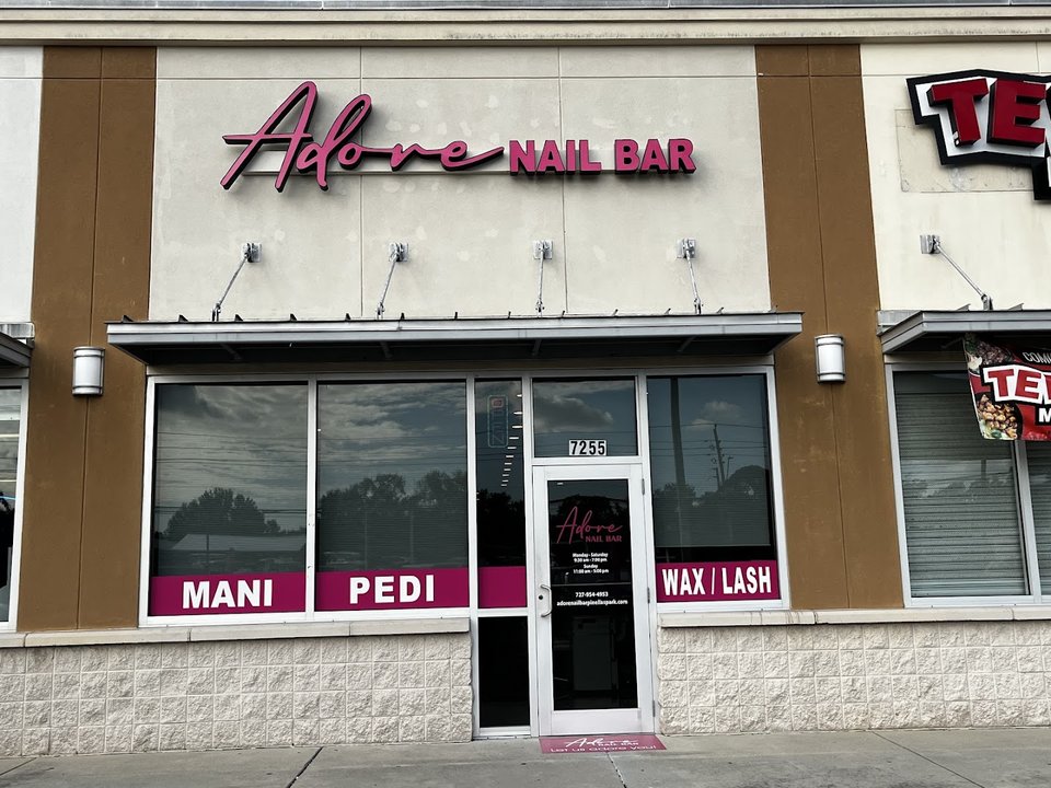 Clean pedicure chairs and polished work surfaces.